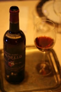 A bottle and a glass of Brunello di Montalcino Italian wine