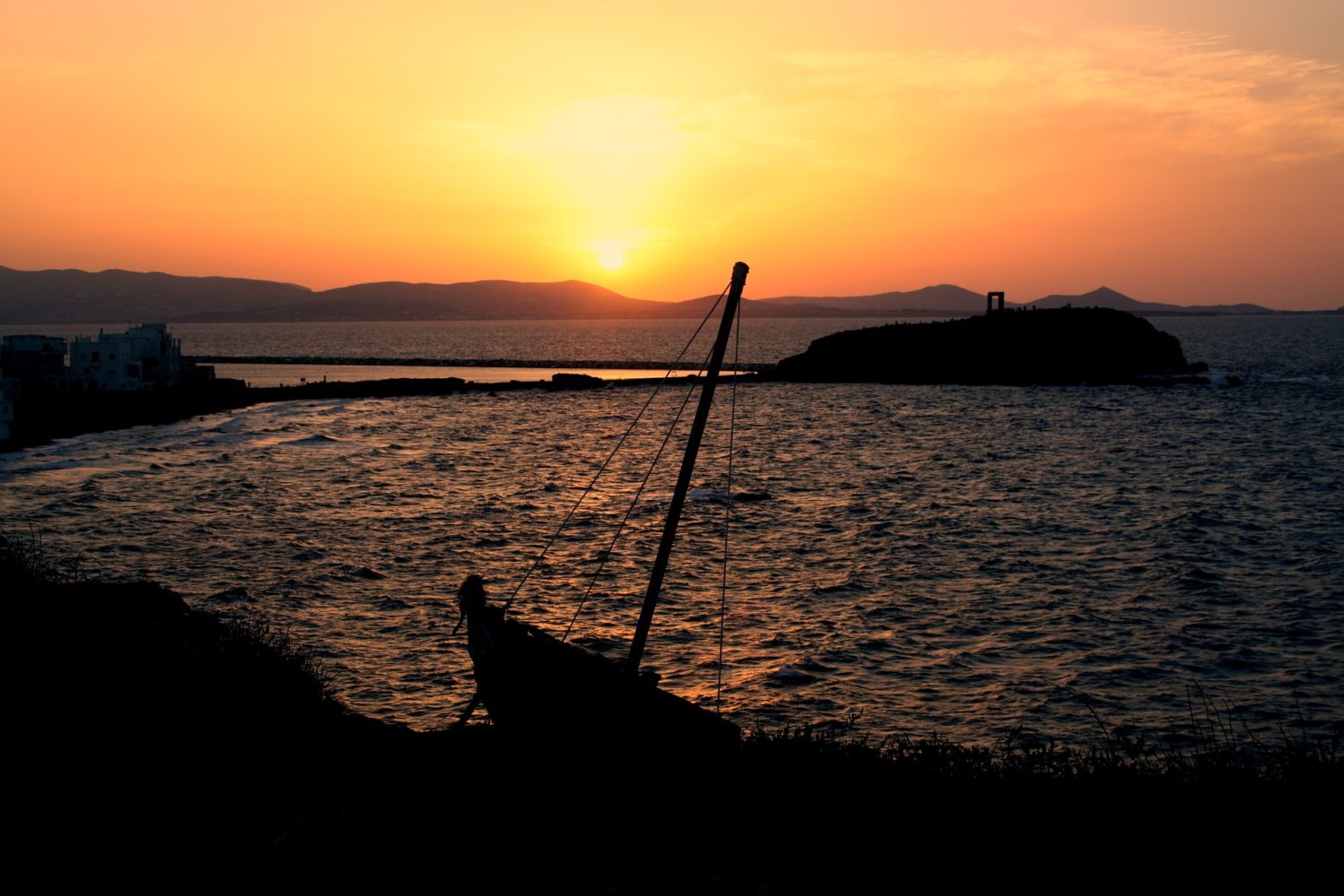 After a day of hiking the Greek islands, take in the relaxing seas at sunset.